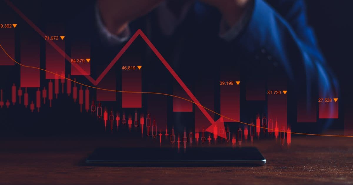 a businessman looking at a stock chart.jpeg